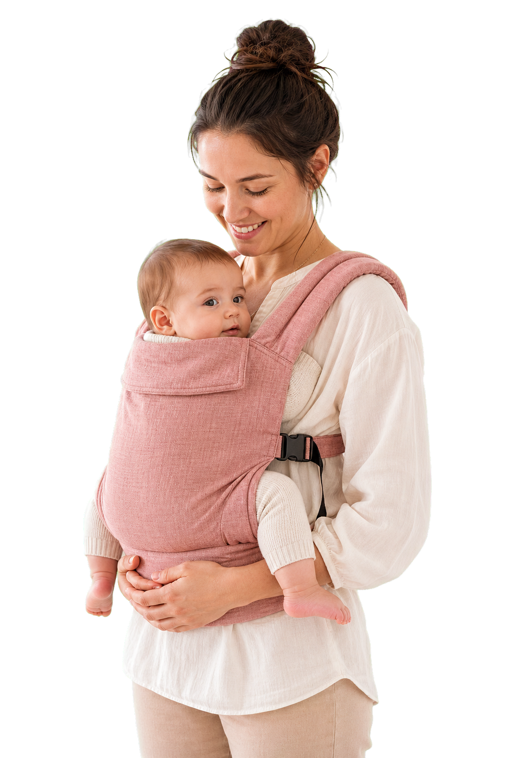 Un parent porte son bébé dans un porte-bébé ergonomique rose